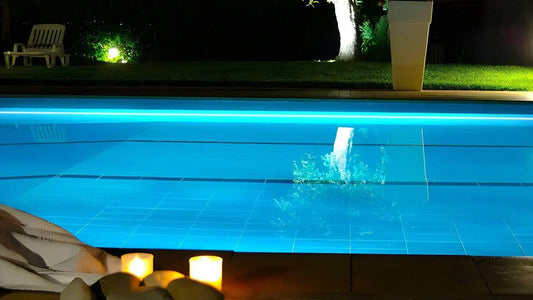 Pool with PaneraLux pool led strip lights in backyard
